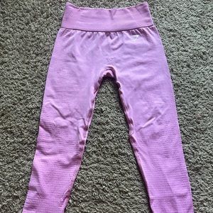 Gymshark leggings - gently used. Size small. Color is light pink.
